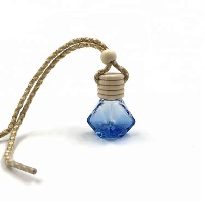 China made 8ml blue hanging car perfume glass diffuser bottle with wooden cap