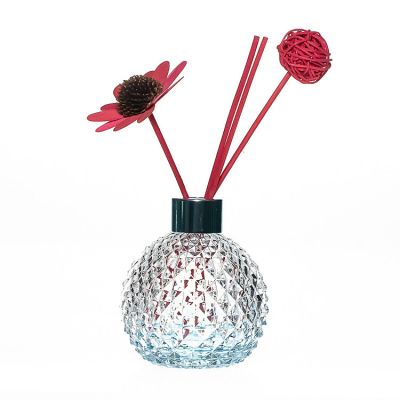 Custom Design 120ml 4oz Embossed Round Crystal Glass Aroma Oil Bottle with Diffuser Flower 