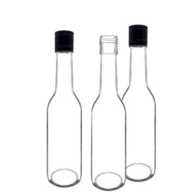 Best selling empty soda water and milk packaging glass bottles , 250ml clear glass round flask beverage juice bottle