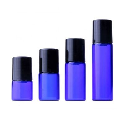Wholesale blue essential oil bottle 1ml 2ml 3ml 5ml mini cosmetic roll on glass bottle for travel use 