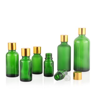 High quality 50ml green glass cosmetics essential oil bottle with childproof cap