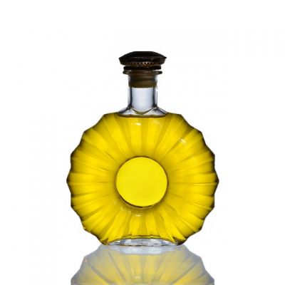 Wholesale 700ml empty round super flint glass bottle for whiskey brandy XO