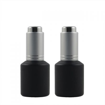 Quick shipping 15ml stock frosted black glass press dropper bottle with silver drop