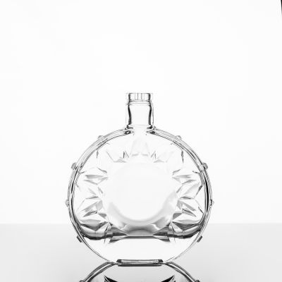 Wholesale High Quality Fancy Design Round Shape Embossed Liquor Vodka Wine Spirit Glass Bottle 