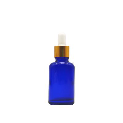 Hot Sale Blue Glass Essential Oil Bottle For Cosmetic 20ml Empty Flat Shape With Dropper 