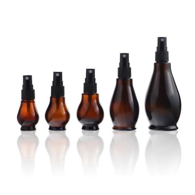 Small Size Amber Gourd Shaped Glass Cosmetic Spray Pump and Dropper Bottle for Essential Oil