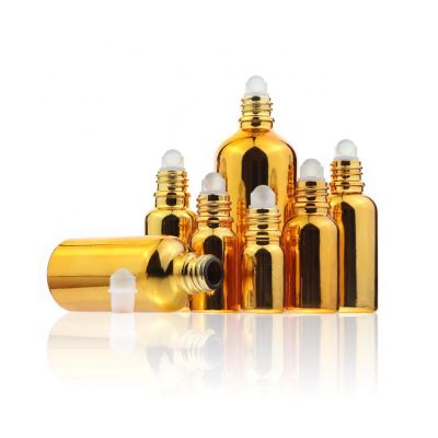 Customized 10ml 20ml 30ml Gold Glass Massage Essential Oil Bottle Roller Ball