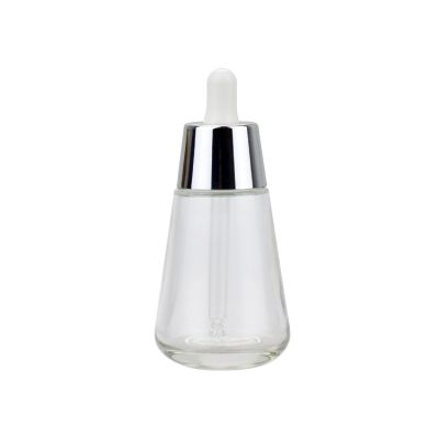 30ml cosmetic package wholesale essential oil bottle glass with silver collar fancy glass cosmetic serum dropper bottle