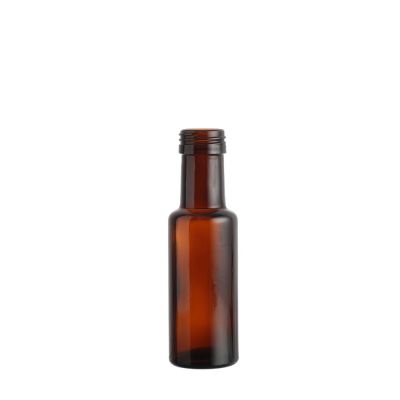 Custom unique design 100 ml round clear amber olive oil glass bottle with screw