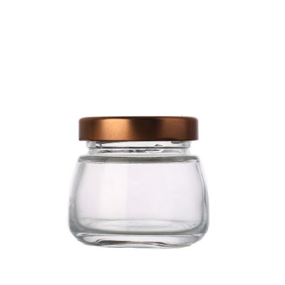 China manufacturer empty 50 ml 70 ml clear round empty bird nest glass bottle jar with screw lid 