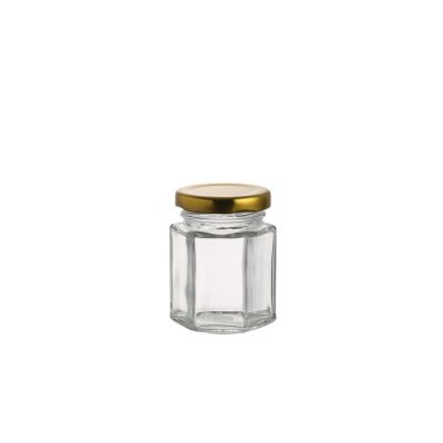 Fancy shape top quality 85 ml empty container glass hexagon food honey jar with lid 