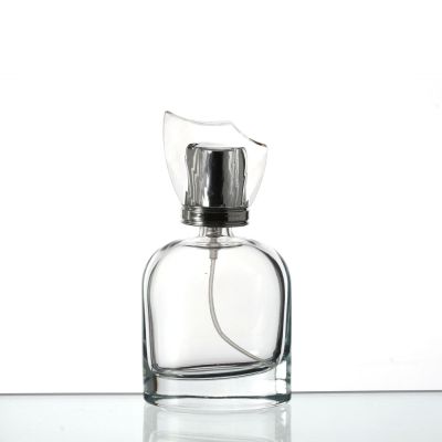Wholesale china supplier round custom made logo pump glass perfume bottles with spray 