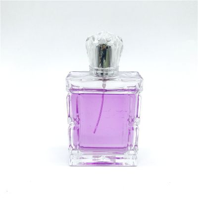 Custom wholesale 100ml stylish design square glass perfume bottle with sprayer and lid 