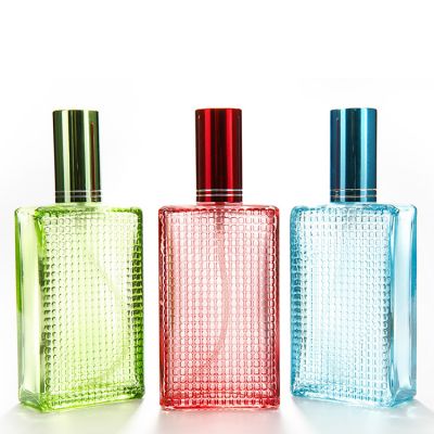 Wholesale new design of 32ml personalized glass empty perfume bottles in a variety of custom colors with sprayer 