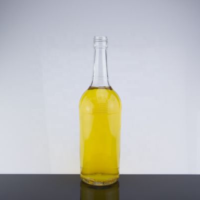 750ml Screw Cap Sealed Long Neck Design Brandy Glass Bottle With Embossed Logo Wholesale 