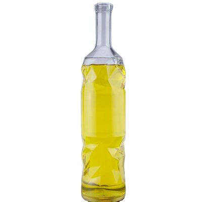 Factory Made Top Quality Customized Embossed Top And Bottom 750ml Liquor Glass Bottles For Vodka With Cork Stopper 