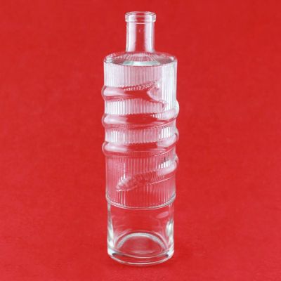 Low Price Food Grade 750ml Round Shape Glass Bottle Embossed Snack Simple Mouth Vodka Glass Bottle With Cork Cap 
