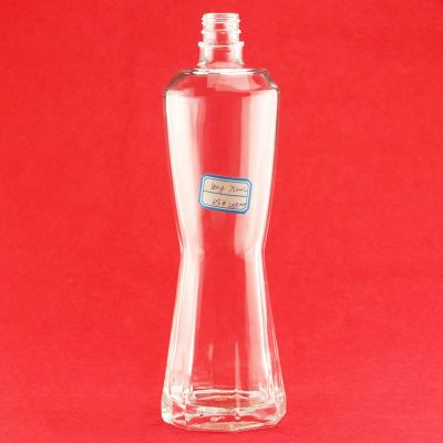 New Product Creative Design Round Shape Glass Bottle 750ml Slim Waist Hexagonal Bottom Smallmouth Whiskey Glass Bottle 