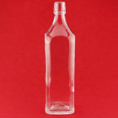 Custom Logo Embossed Glass Bottle 700ml Square Whiskey Bottle Food Garde Glass Bottle With Swing Top 
