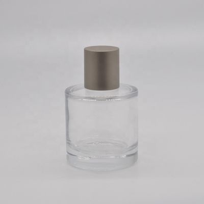 Beautiful 50ml transparent clear glass perfume sprayer bottle with zinc cover
