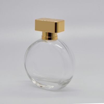Wholesale unique design round small empty perfume bottles with cap 