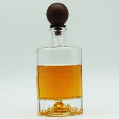 Luxury vodka whisky bottle volcano shaped thick bottomed whisky vodka glass bottle with stopper