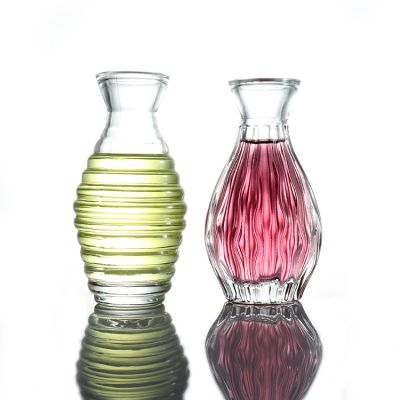 wholesale100ml round perfume aroma diffuser clear display glass bottle with glass cork