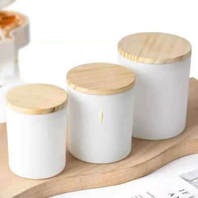 Wholesale 200ml 320ml 430ml high quality simple style glass candle jar with customized logo and wooden lid