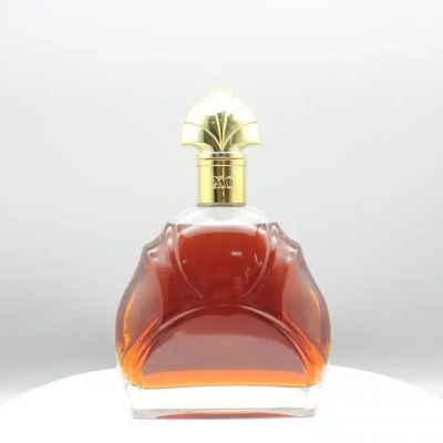 glass rum bottle 700ml with embossed unique patterns and metalizated plastic cap and cork