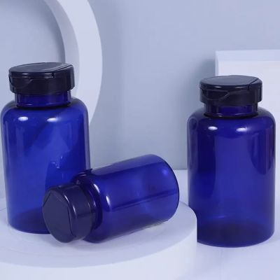 transparent blue bottle pill capsule bottle high quality HDPE/PE OEM/ODM silver double layer golden cap