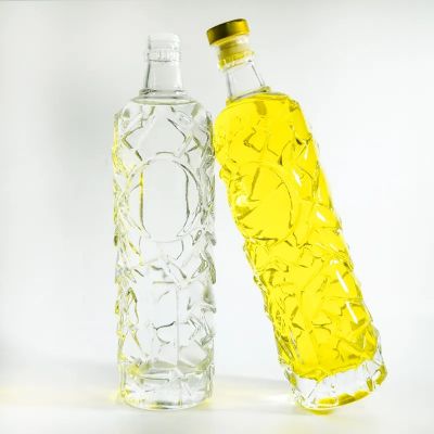 Embossed glass bottle with label carving beverage glass bottle