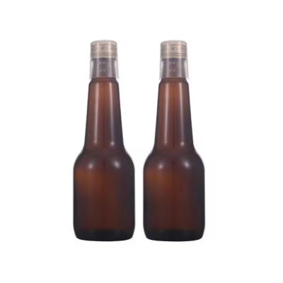 Custom Logo 200ml Empty Original Round Amber Syrup Glass Bottles with Gold Cap Measuring Cup Manufacturers