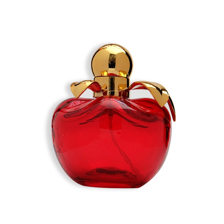 red apple shaped perfume bottle