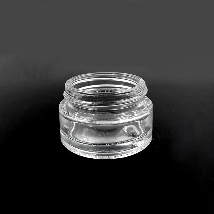 Hot sale 5g airless clear cosmetic glass cream empty jar with smooth black lid 