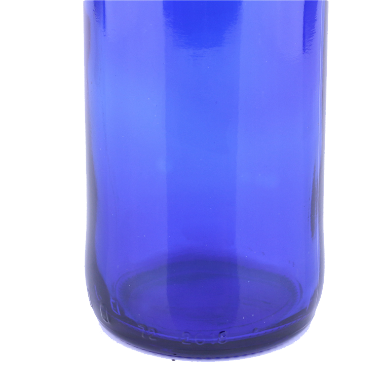 Wholesale china manufacturer cobalt blue 16 oz glass beer bottle glass with crown lid