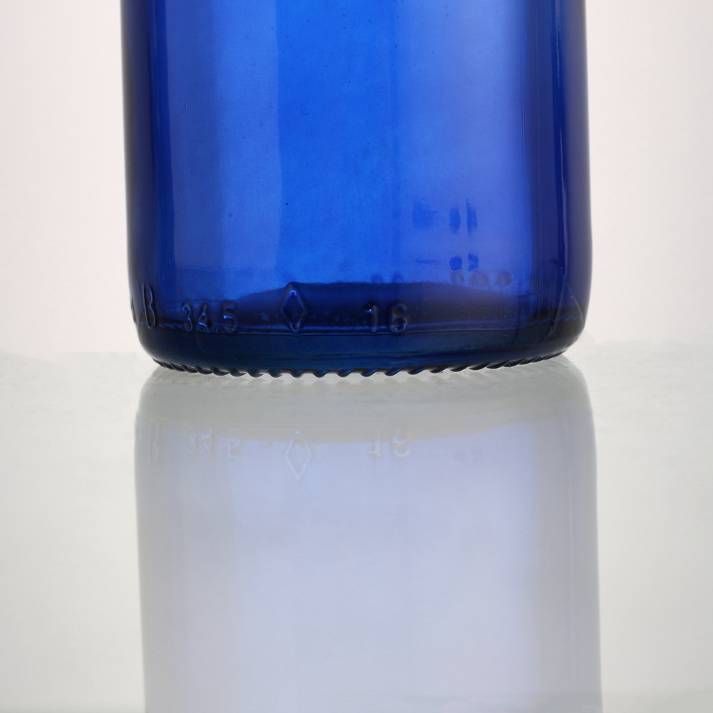High quality good price 250 ml bulk extra flint round blue beer glass bottle crown lid 