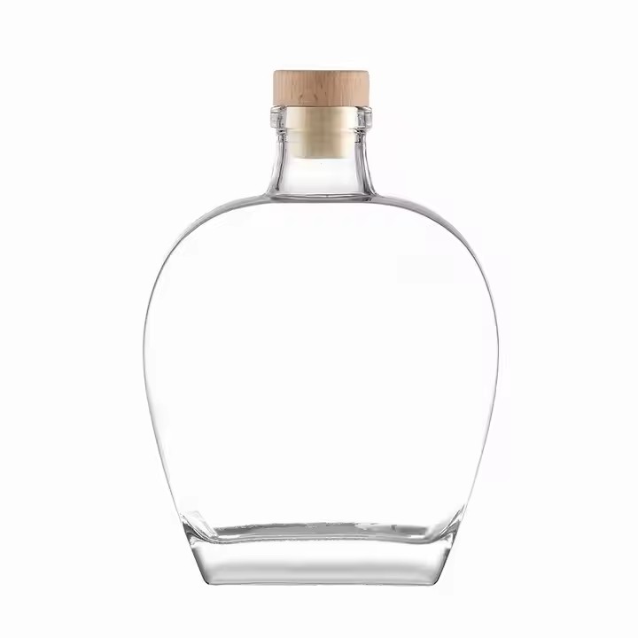 Customized 500ml Transparent Round Hollow Flint Glass Whiskey Bottle with Rubber Cork Stopper for Brandy Wine Vodka Tequila