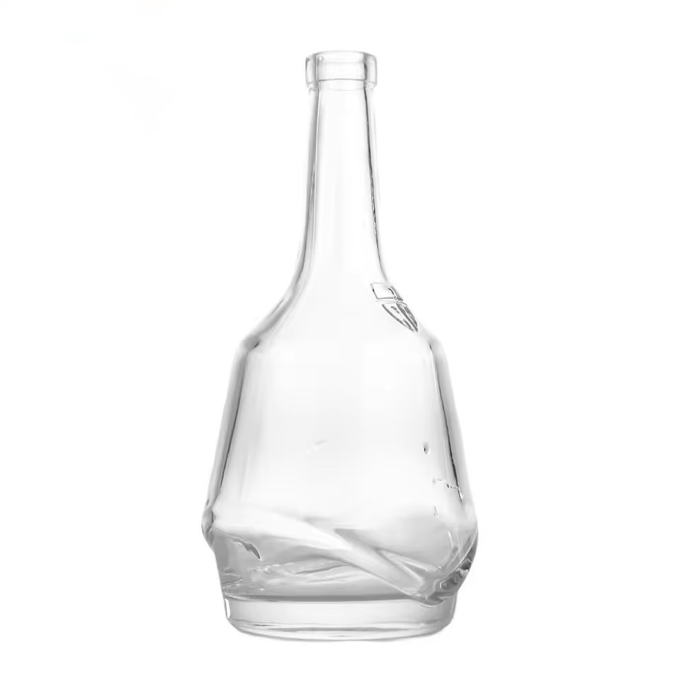 Wholesale 700ml Custom Geometric Extra Flint Clear Glass Liquor Bottle with V-Shaped Base for Whiskey Gin Vodka Spirits