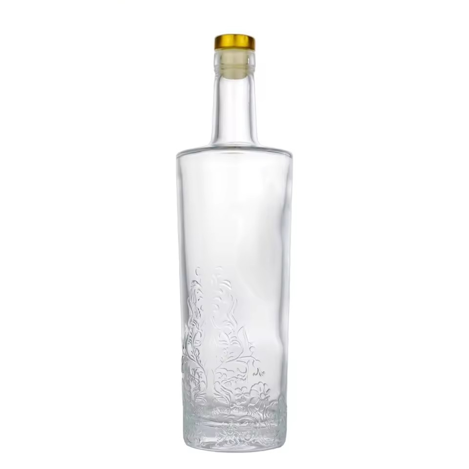 Wholesale Popular 700ml Classical Straight Shoulder Round Tall Embossed Flower Vodka Whiskey Tequila Empty Glass Bottles