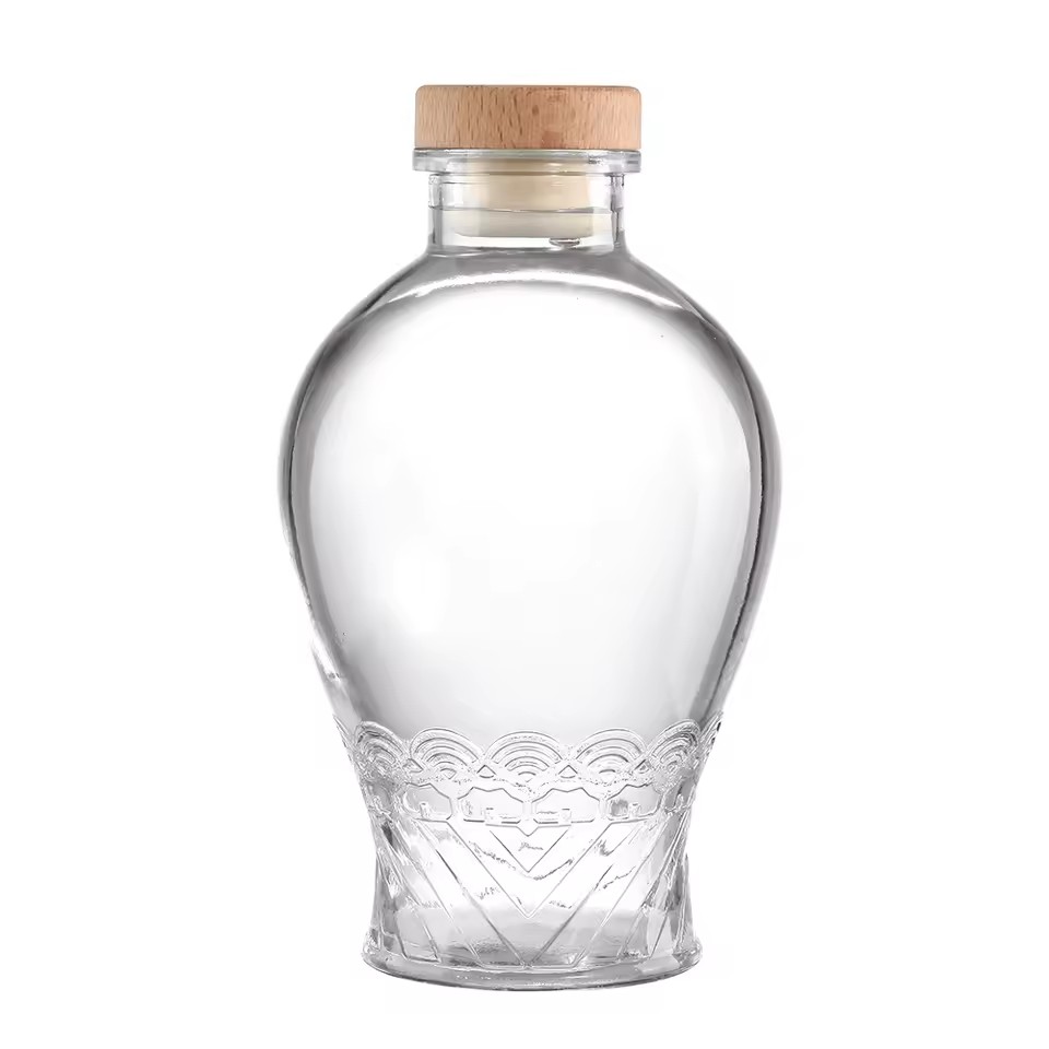 Wholesale Europe Popular Custom 750ml Round Shape Crystal White Material Glass Bottles Whisky Spirits Bottle with Cork Cap