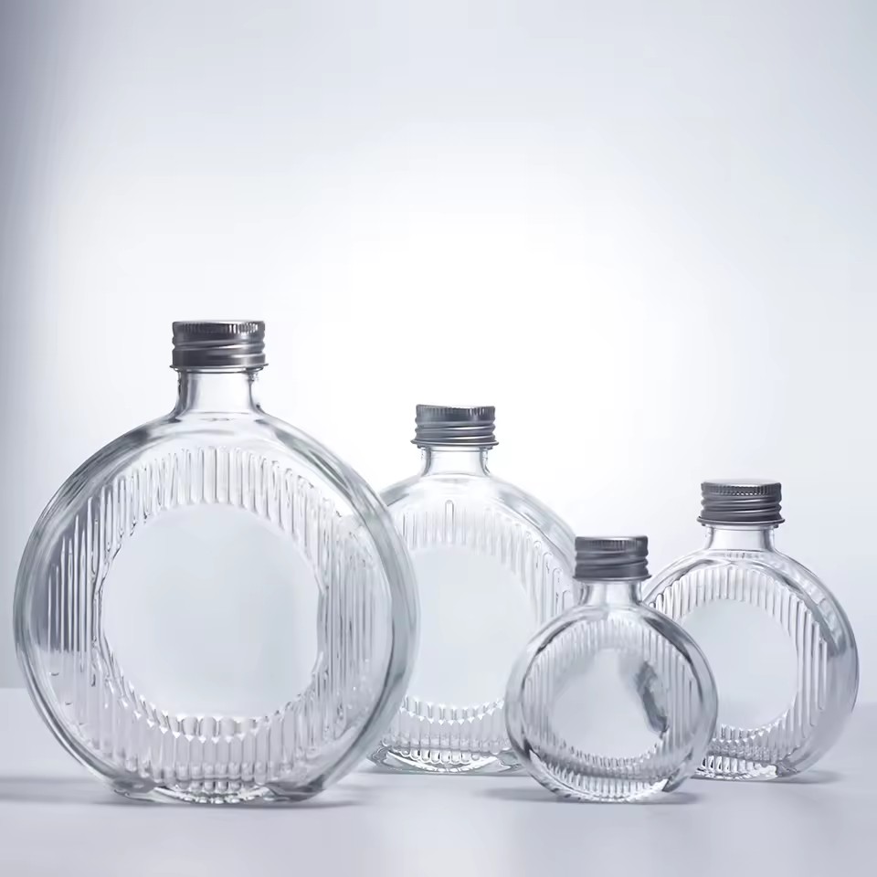 High Quality Recyclable Glass Bottle for Household Storage Customizable Different Sizes Screw Cap for Juice Vegetable Carton
