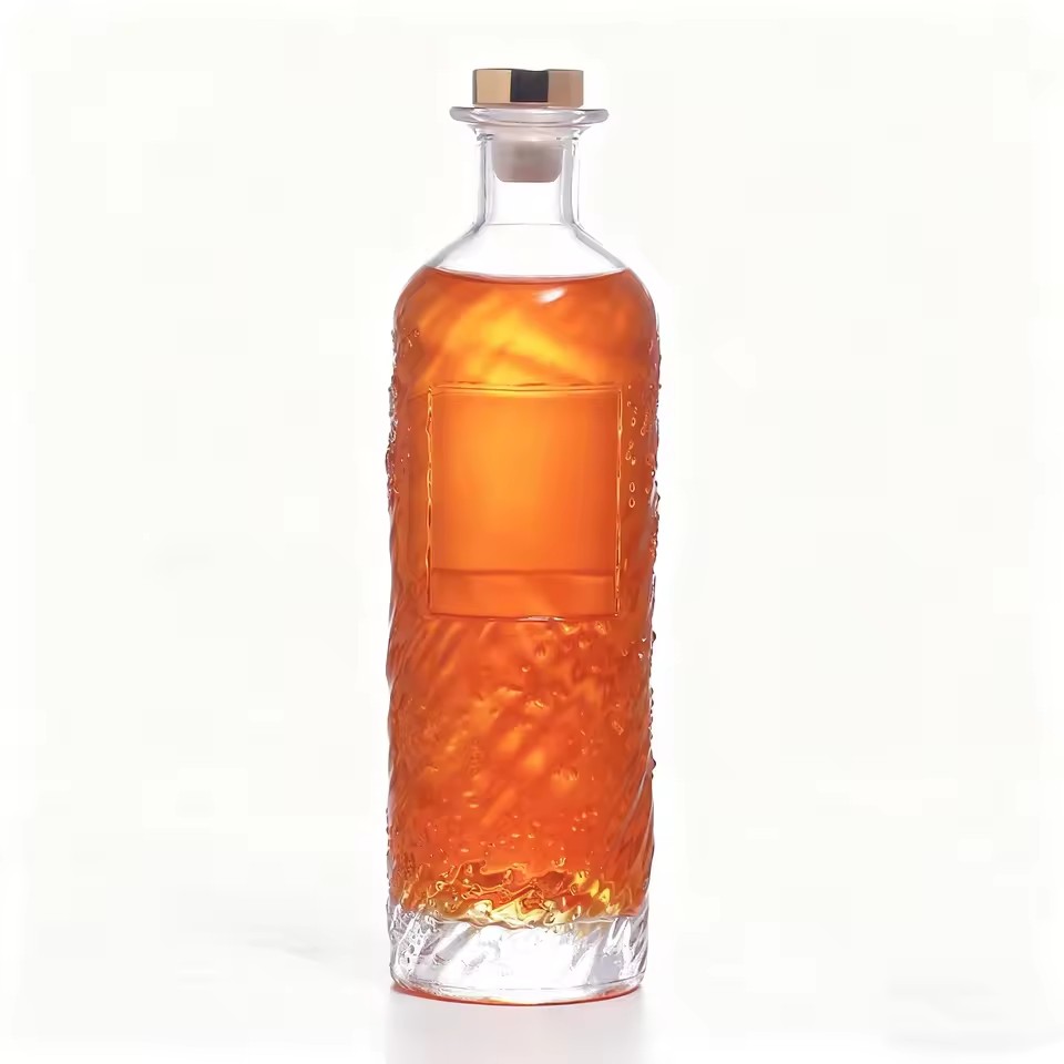 Customizable 500ml Glass Bottle with Cork Seal 3D Pattern Engraving Frosting Options for Whiskey Tequila Packaging