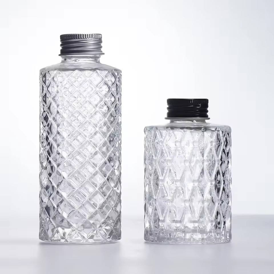 Hot Selling 100ml 150ml Cylindrical Vertical Bar Pattern Glass Spirit Bottle Easy Carry Small Cocktail Vodka Rum Tequila Bottle