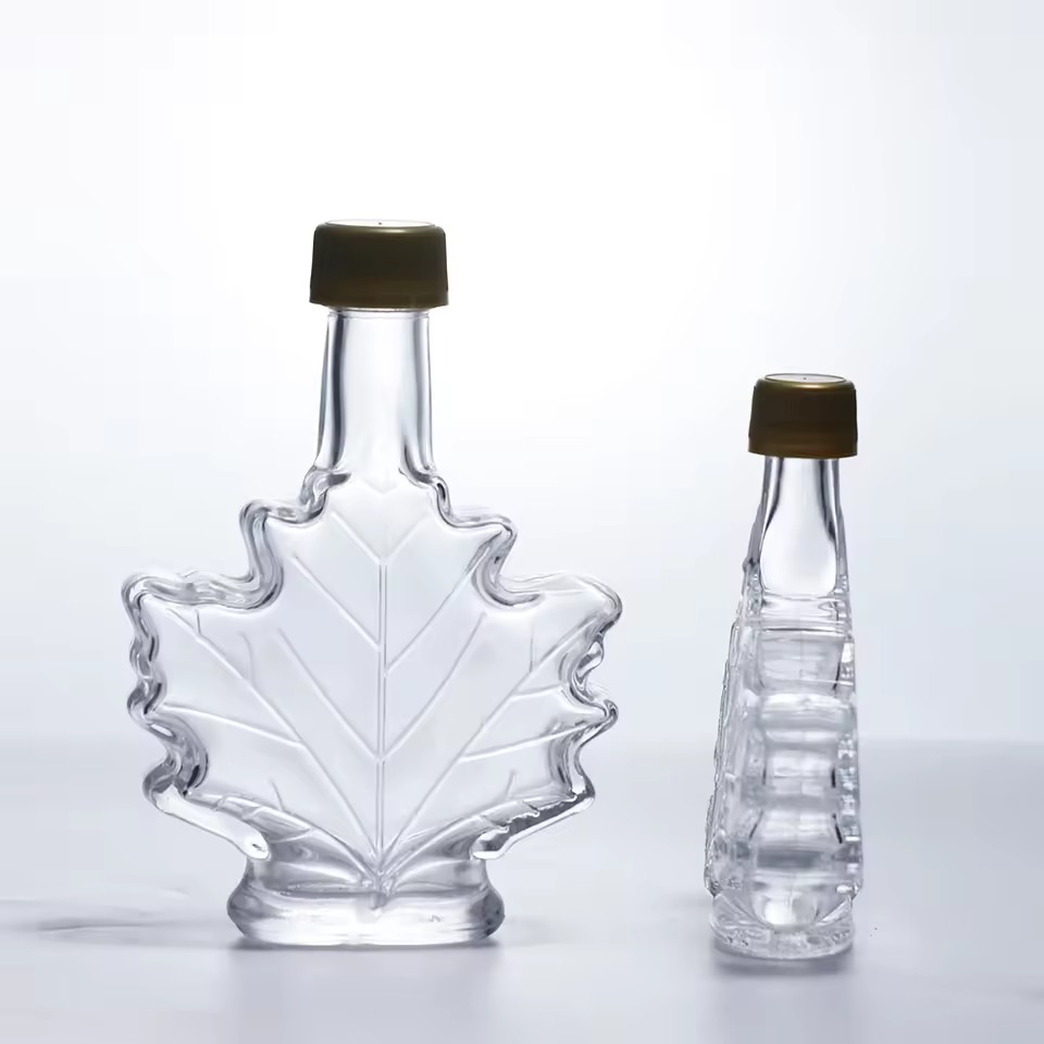 Wholesale Flat Maple Leaves Shape Plastic Wine Glasses Energy Drinks Bottles 50ml 100ml 250ml Sizes Sealed Screw Tequila Brandy