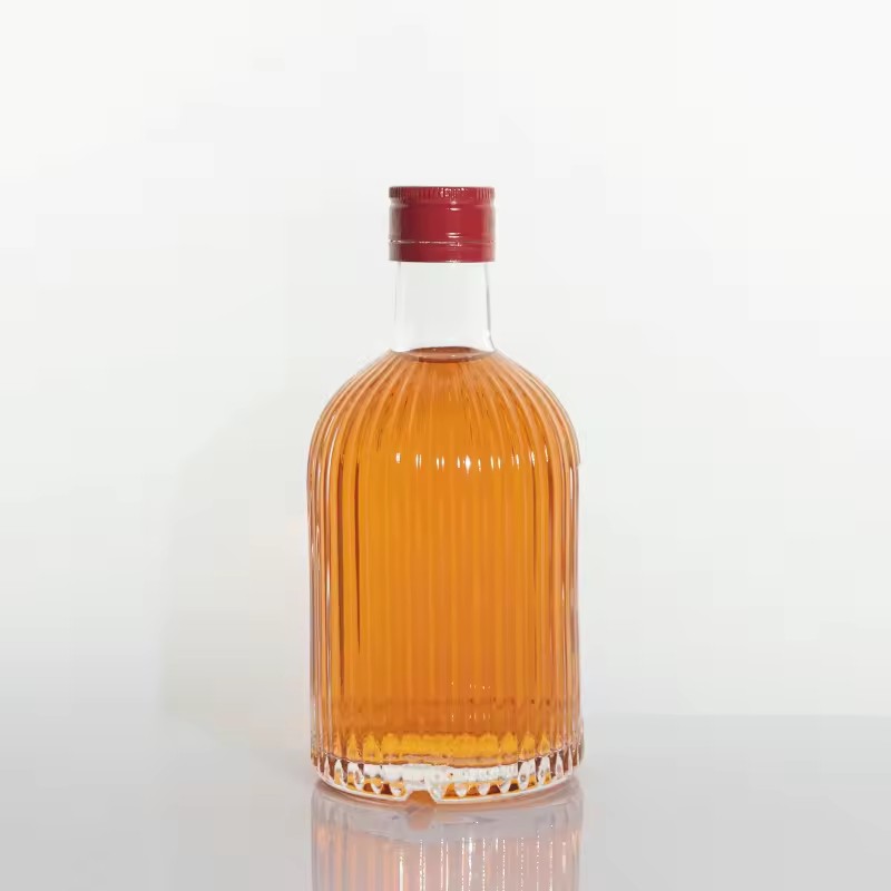 Factory-direct-sale Hot-selling Cylindrical Glass Bottles with Patterns for Whisky Brandy Gin 330ml