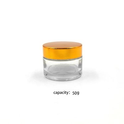 Flint round childproof cream glass jar 50ml with gold alumite lid 
