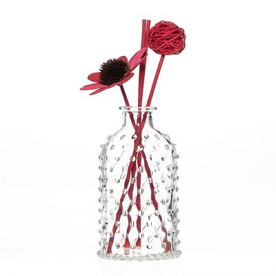 Wholesale 220ml 7.5oz Round Embossed Decorative Vase Empty Glass Reed Diffuser Bottle with Cork 