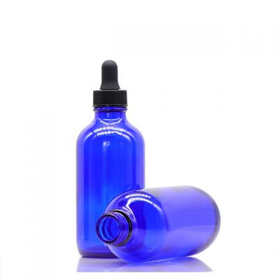 Wholesale essential oil spray boston round glass bottle 4 oz. with cap and pump packaging oil bottles 