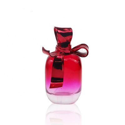 Exquisite Flat Round Red Glass Perfume Bottle 100ml With Bow Cap 
