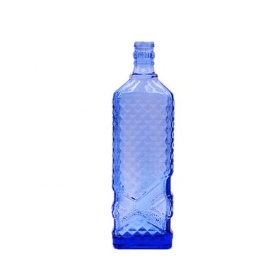 china 500ml creative design emboss glass liquor bottle supplier 